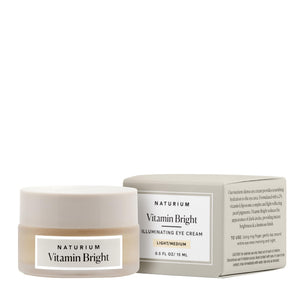 Tube of Naturium Vitamin Bright Illuminating Eye Cream, featuring a light/medium tint for correcting dark circles.